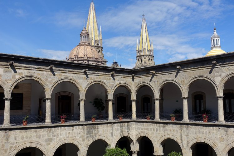 This shows the proximity to the cathedral (spires) and El Sagrario (large dome)