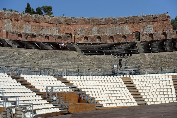 (C) TAORMINA: One of the highest points in town is the ancient Greek Theatre, which dates from the 3rd century.
