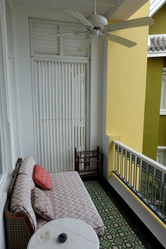 This view of our balcony also shows the corner location: the olive colour is on a separate building